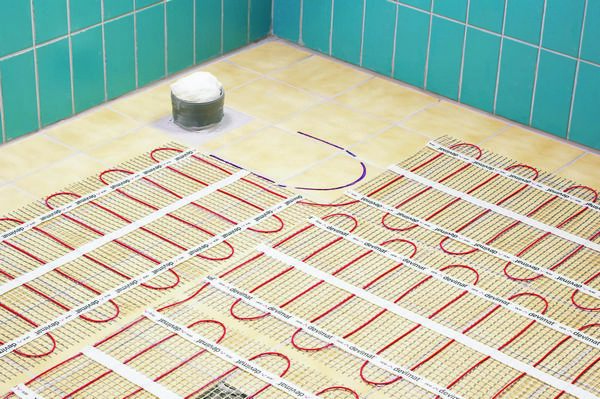 Теплый пол в ванной и эксплуатация нагревательных систем 